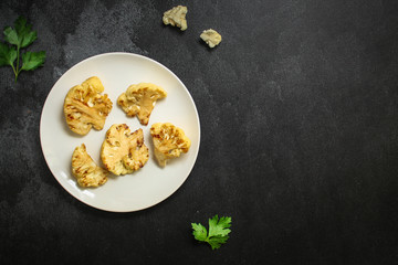 cauliflower grilled (fried grill vegetables or snack salad, bruschetta with tomato) menu concept. food background. copy space. Top view