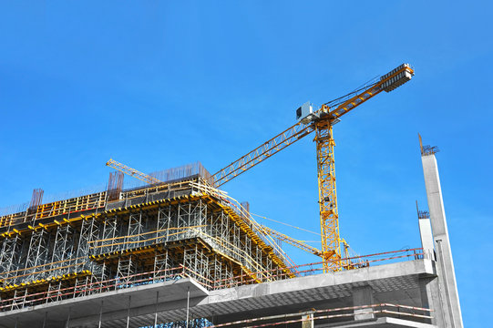 Crane And Highrise Construction Site