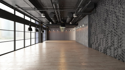 Large open empty space with concrete wall illuminated by natural light from windows