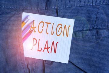Word writing text Action Plan. Business photo showcasing detailed plan outlining actions needed to reach goals or vision Writing equipment and white note paper inside pocket of man work trousers