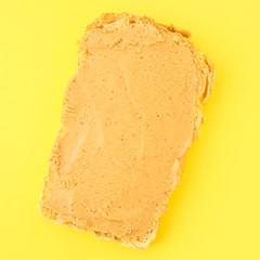 peanut butter sandwich (tasty snack, bread toast buttered with nut butter) menu concept. food background. copy space. Top viev