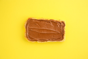 chocolate nut butter sandwich (delicious snack, bread or toast and nut butter, paste, classic combination of taste, Italian cuisine) menu concept. food background. copy space. Top view
