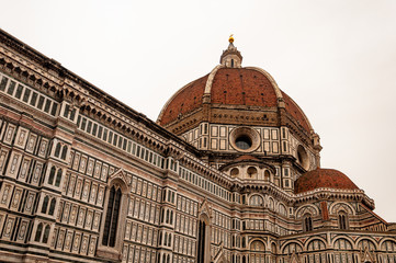 Fototapeta premium Florence, UNESCO Heritage and home to the Italian Renaissance, full of famous monuments and works of art all over the world: detail of Cathedral of “Santa Maria del Fiore”.