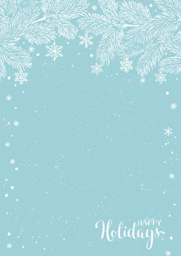 Winter holidays or Christmas background with pine branches and snowflakes.