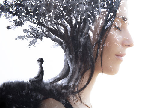 Paintography. Double Exposure portrait of a serene woman with closed eyes combined with hand made painting of a person sitting under a tree