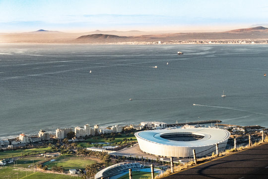 Arial View Of Green Point Football Stadium In Cape Town With Ocean Behind It