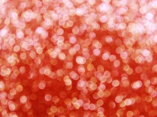 abstract red background soft blurred christmas lights garland