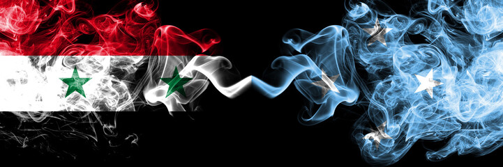 Syria vs Micronesia, Micronesian smoke flags placed side by side. Thick colored silky smoke flags of Syrian and Micronesia, Micronesian
