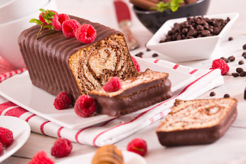 Marble cake  with raspberries.