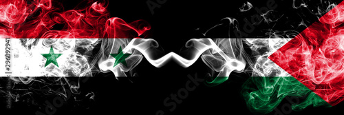 Syria vs Palestine, Palestinian smoke flags placed side by side. Thick colored silky smoke flags of Syrian and Palestine, Palestinian
