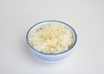 Japanese ripe rice with sesame in ceramic cup