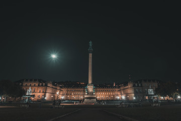 Fototapeta na wymiar Full moon over castle Stuttgart night photography, photographed from castle square
