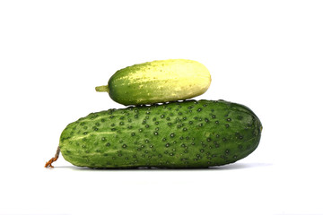 Ripe cucumbers of different grade isolated on a white background.