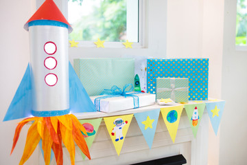 Space theme kids birthday party. Room decoration.