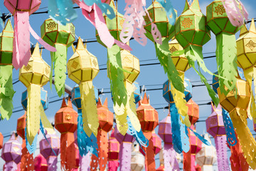 Naklejka premium Colorful paper lantern hanging at Wat Phra That Hariphunchai Lamphun Thailand