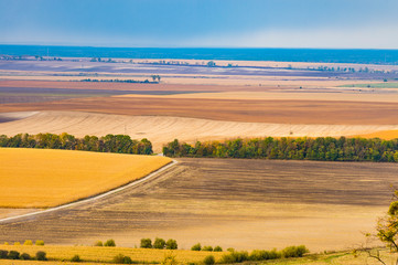  panorama of beautiful boundless colored fields in autumn