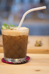 Espresso, mint and lime cocktail in a glass.