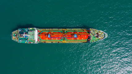 Ship tanker oil or gas LPG parking on the sea waiting for unload to refinery, Aerial view oil tanker ship loading in port view from above.