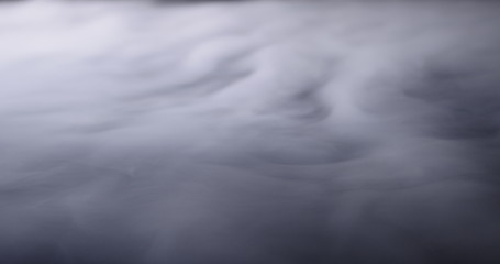 Fototapeta premium Realistic dry ice smoke clouds fog overlay perfect for compositing into your shots. Simply drop it in and change its blending mode to screen or add.