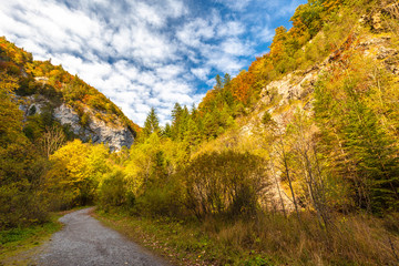 Mountain landscape in autumn sunny day. Hiking trail through Kvacianska valley, Slovakia, Europe.