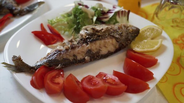 Fish dish on yacht