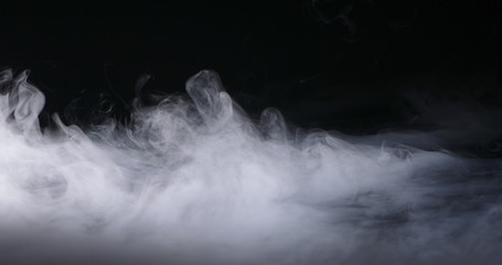 Fototapeta Realistic dry ice smoke clouds fog overlay perfect for compositing into your shots. Simply drop it in and change its blending mode to screen or add. obraz