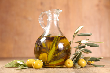 bottle of olive oil and herbs