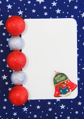 New Year white card on a blue background with white stars and toys balls for the Christmas tree