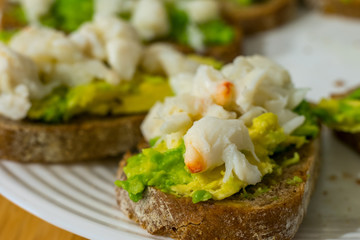 Bruschetta with crab and avocado