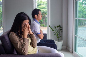 Obraz premium Couples are bored, stressed, upset and irritated after quarreling. Family crisis and relationship problems that come to an end