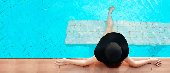 Fototapeta na wymiar Summer day lifestyle asian woman with big hat relax and chill