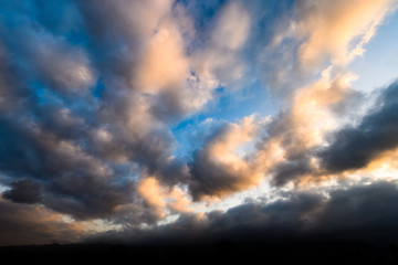 Obraz premium Cumulus Clouds Glow Orange at Sunrise 1