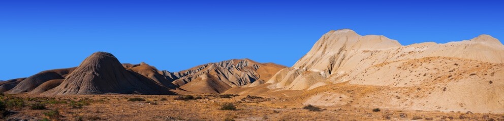 Obraz premium Wide panorama of a beautiful desert mountain landscape