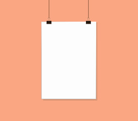 White poster mock up hanging on rope with paper clips near Pink peach color wall. Blank Canvas...