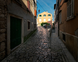 Fototapeta na wymiar The streets of the old city of Rovinj. The beauty of old Croatia.