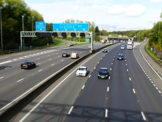 Tilt shift photo of the M25 London Orbital Motorway near Junction 17 in Hertfordshire, UK