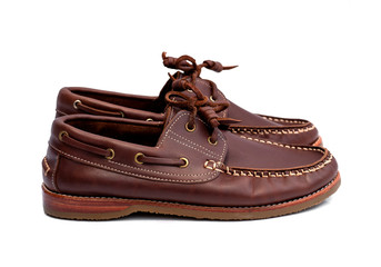 Boat shoes isolated on white background. Fashion advertising shoes photos.
