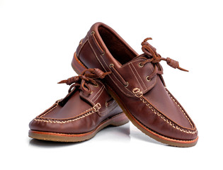 Boat shoes isolated on white background. Fashion advertising shoes photos.