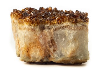 Block of natural citrine quartz mineral from Brazil isolated on a pure white background