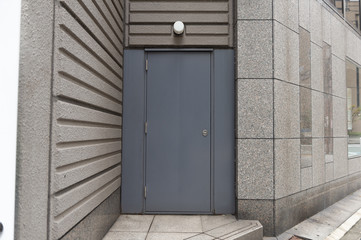 sidewalk by street wall & door