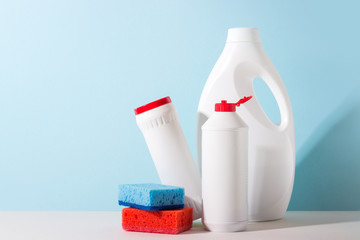 different cleaning agents on a blue background