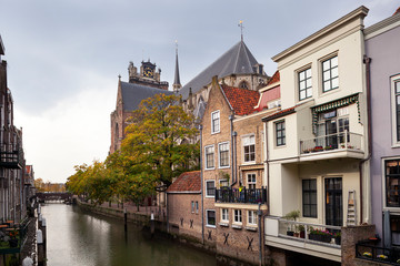 Fototapeta na wymiar Bridge and canal houses in Dordrecht in the Netherlands