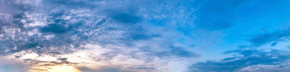 Obraz premium Panorama of Dramatic vibrant color with beautiful cloud of sunrise and sunset. Panoramic image.