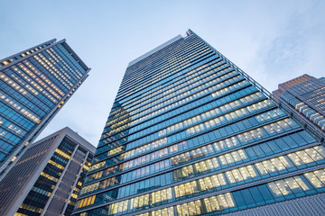 Fototapeta na wymiar Windows of skyscraper business office buildings, Corporate building in Tokyo City, Japan. Business concept.