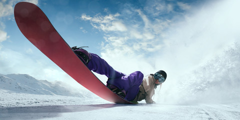 Snowboarder in action. Extreme winter sports.