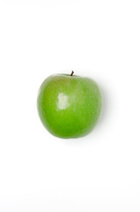 Top view of a green apple isolated on a white background.