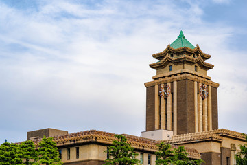 NAGOYA, JAPAN, May-3-2018 : Nagoya City Hall ,Japanese modern style building,the clock is the symbolic of city, the city hall on blue clouds sky background in Japan.