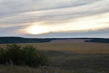 Sunset in fields in autumn