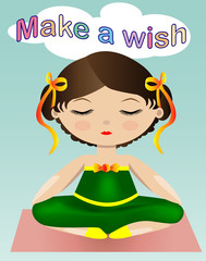 A sweet girl in a green suit is sitting and dreaming with her eyes closed.