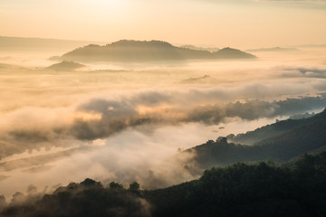 Fototapeta premium Sunrise and the mist in winter morning